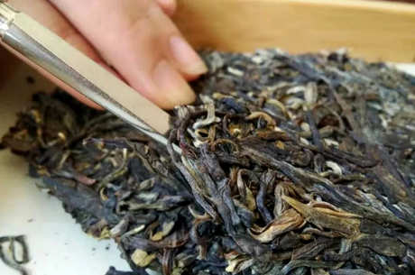 如何拆除普洱茶饼？